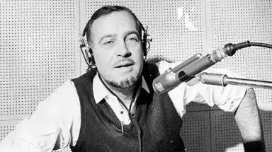 Jean Shepherd at microphone in studio